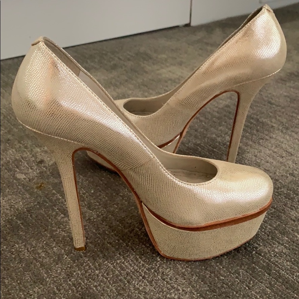Alice and Olivia silver platforms worn once